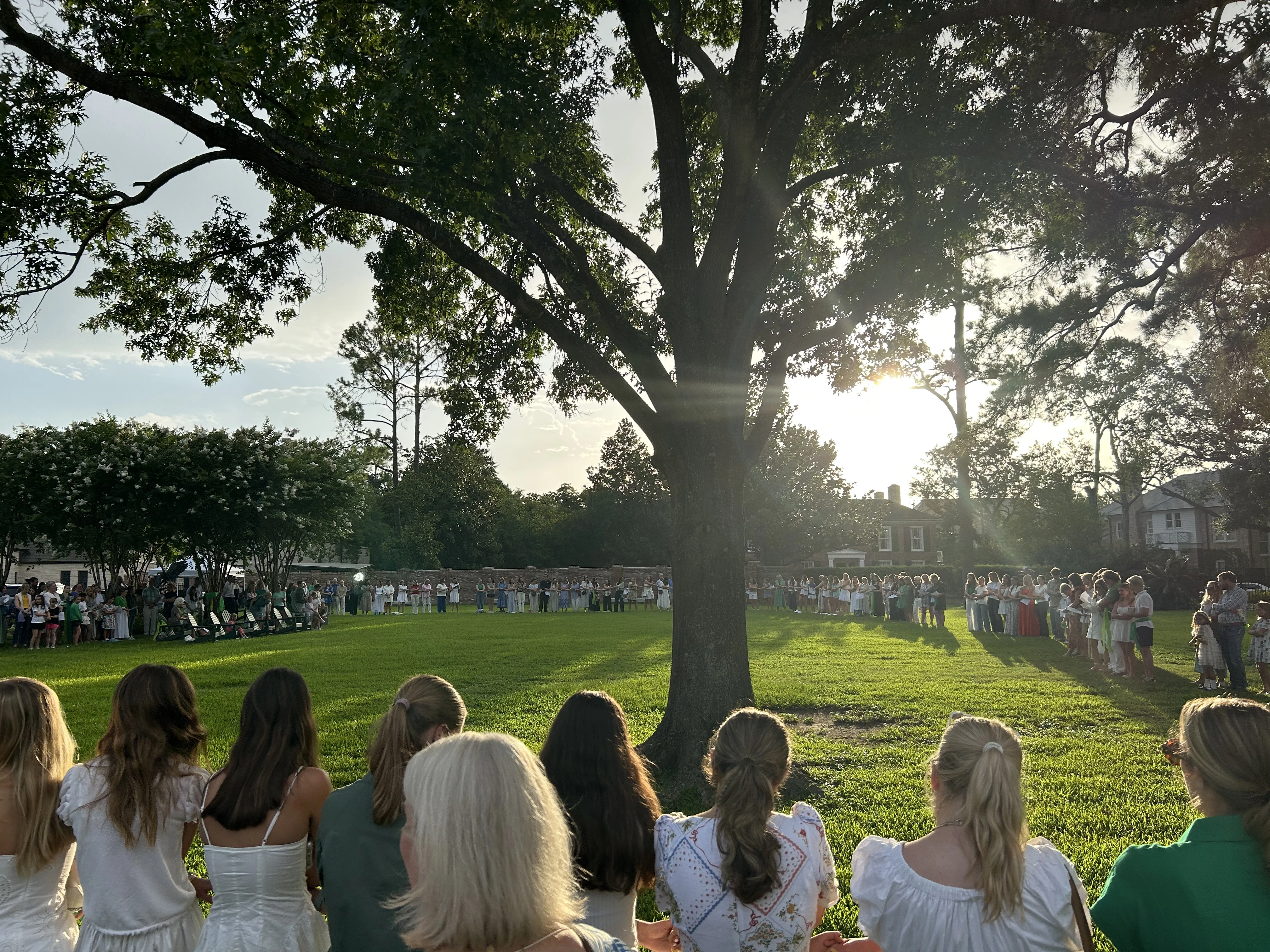 Camp Mystic alumnae and family sing after a memorial service on July 7, 2025, honoring victims of the flash floods in Central Texas over the Fourth of July weekend.?w=200&h=150