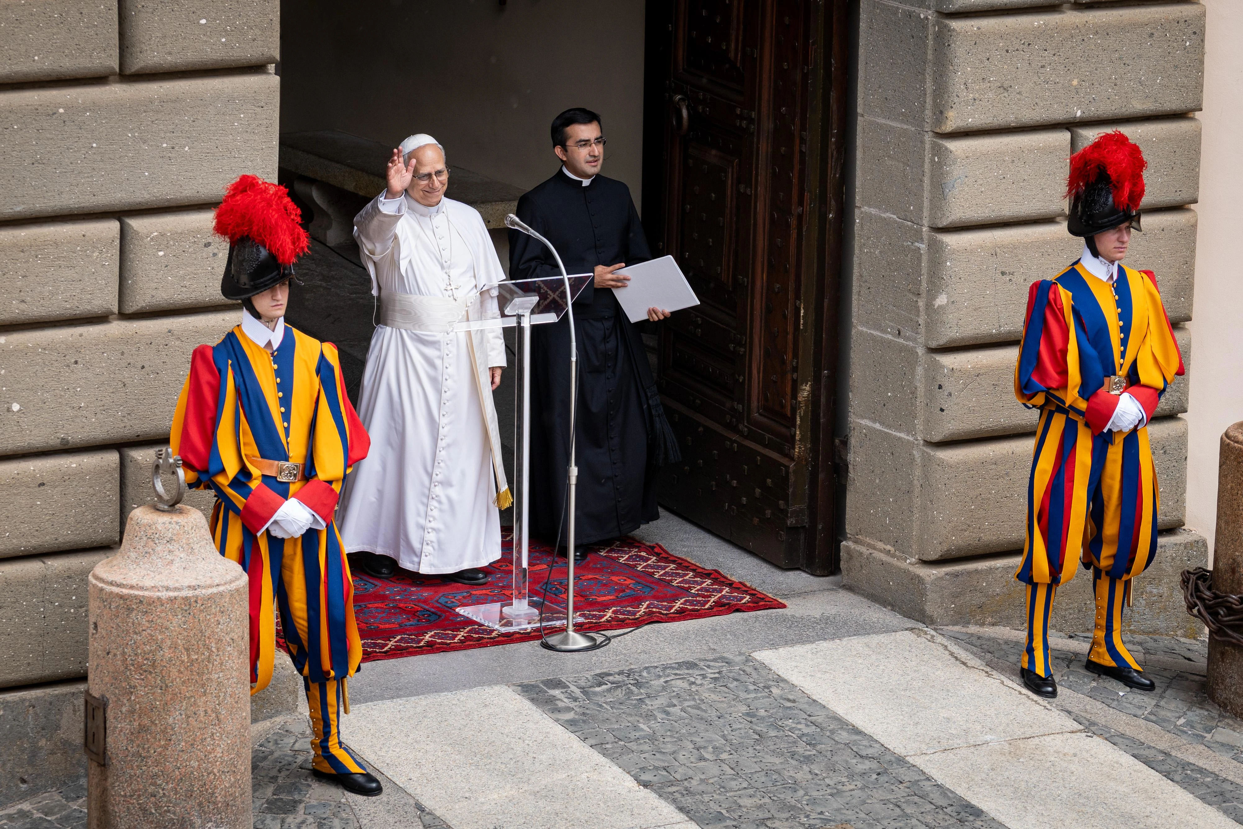 Pope Leo XIV waves as he enters Liberty Square in Castel Gandolfo to give his first public Angelus address from the lakeside town 18 miles southeast of Rome on July 13, 2025.?w=200&h=150