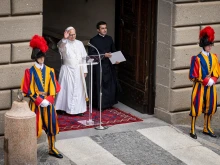 Pope Leo XIV waves as he enters Liberty Square in Castel Gandolfo to give his first public Angelus address from the lakeside town 18 miles southeast of Rome on July 13, 2025.