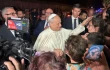 Pope Leo XIV greets the faithful at the gates of Castel Gandolfo on Aug. 19, 2025.