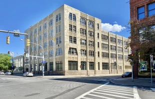 Assets sold to help pay an abuse settlement include the Diocese of Buffalo’s former headquarters, pictured, here, in downtown Buffalo, New York. Credit: Warren LeMay/Flickr, CC BY-SA 2.0