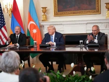 President Donald Trump answers questions during a signing ceremony with Azerbaijani President Ilham Aliyev (left) and Armenian Prime Minister Nikol Pashinyan (right) in the State Dining Room of the White House on Aug. 8, 2025, in Washington, D.C. The agreement signed during the ceremony is intended to bring an end to the conflict between Armenia and Azerbaijani that has lasted for decades.