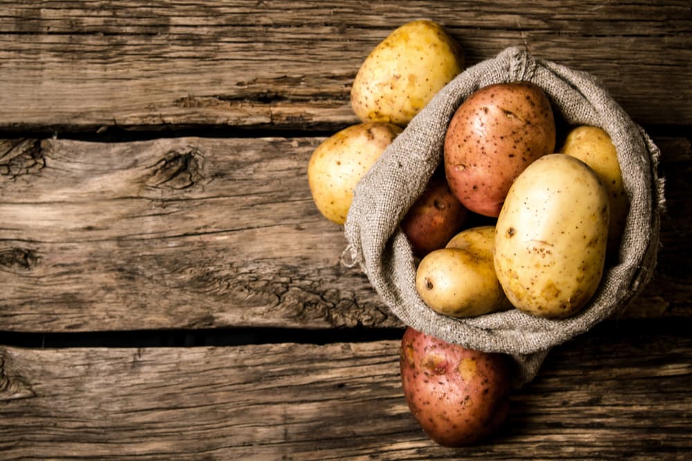 Sack of potatoes on a table