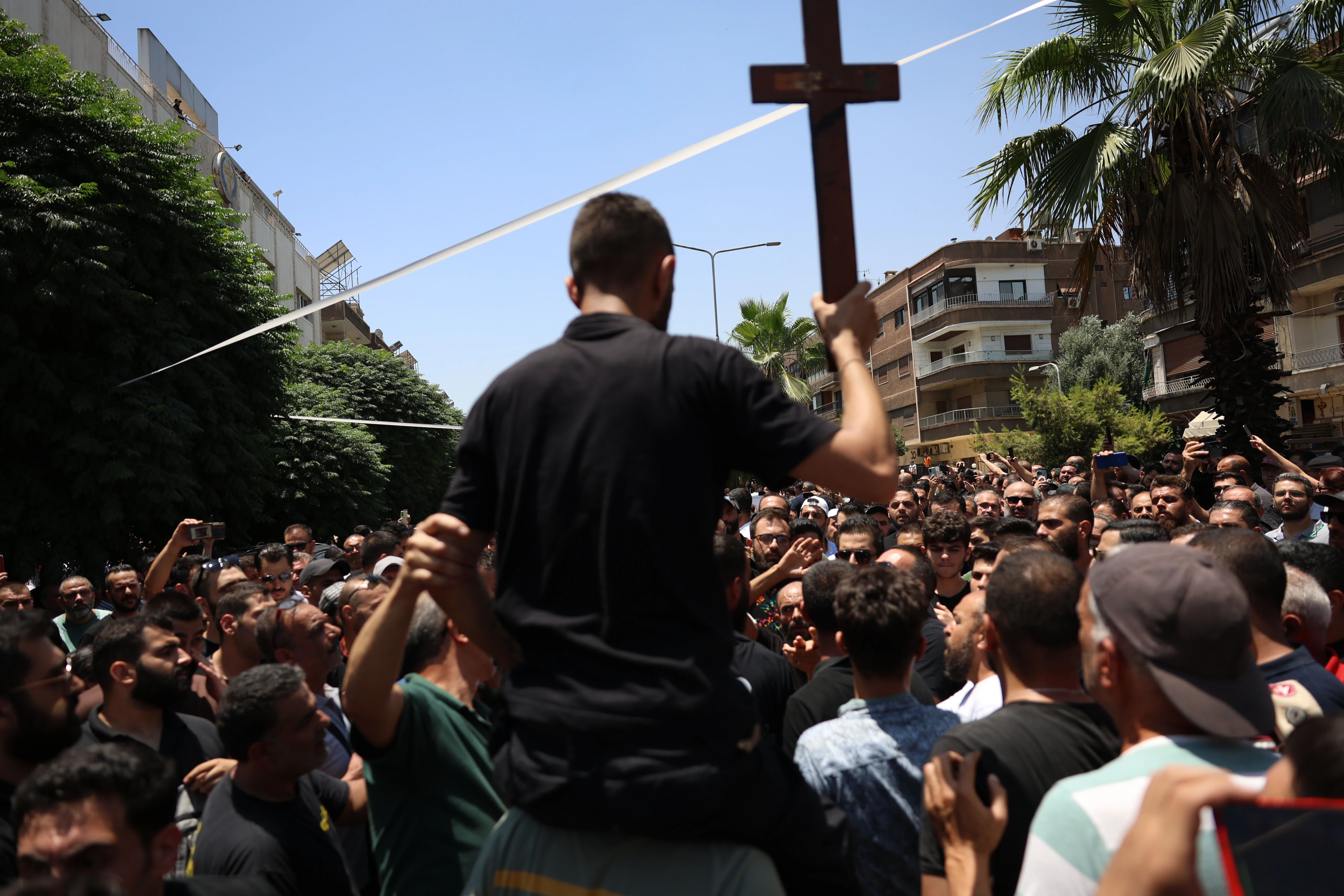 In a scene marked by deep sorrow and righteous anger, churches across Syria held funeral services for the victims of the suicide bombing that targeted St. Elias Church in the Syrian capital, Damascus. The attack claimed the lives of 25 people and left dozens injured.?w=200&h=150