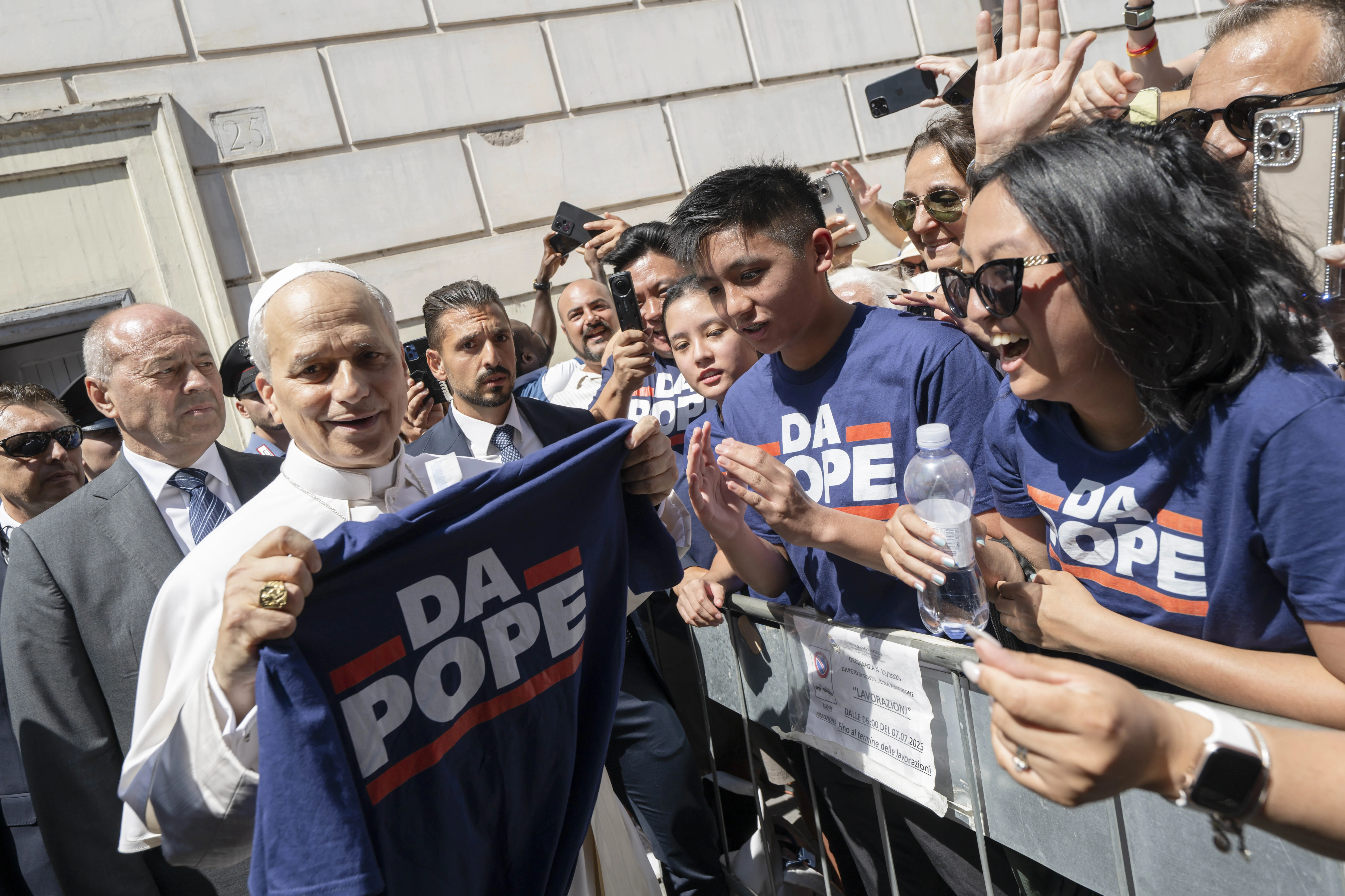 The Muñoz family gives Pope Leo XIV a T-shirt that reads “Da Pope” after Mass in Albano, Italy, on Sunday, July 20, 2025.?w=200&h=150