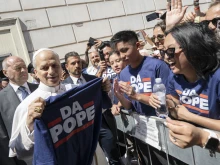The Muñoz family gives Pope Leo XIV a T-shirt that reads “Da Pope” after Mass in Albano, Italy, on Sunday, July 20, 2025.