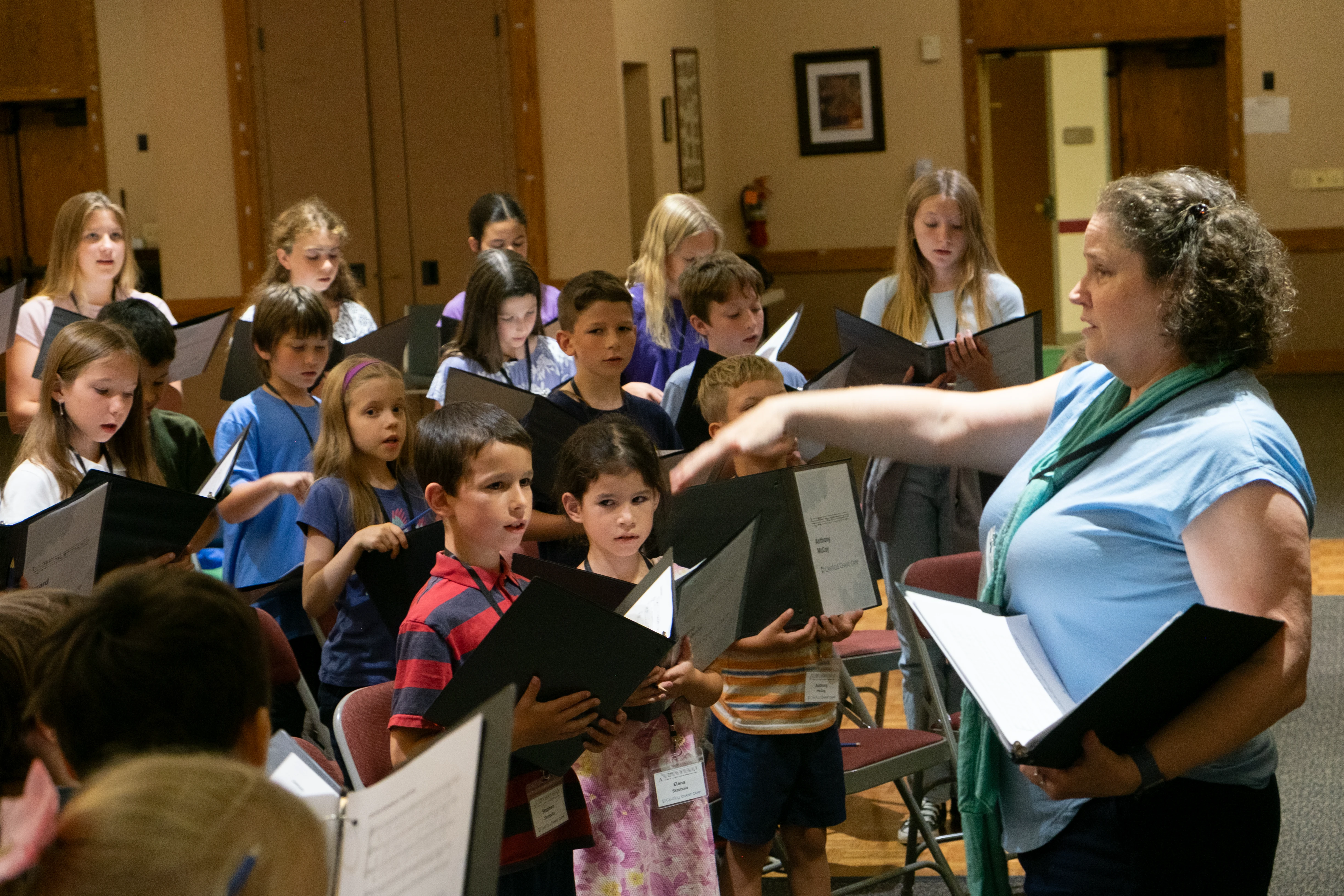 Mary Ann Wilson conducts a children’s choir during Mass at St. Thomas the Apostle Parish in Ann Arbor, Michigan.?w=200&h=150