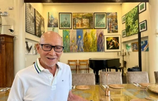 Ernest Escaler, a Filipino businessman, in front of his restaurant, Gourmet Farms Philippines, in July 2025. Credit: Valerie Joy Escalona