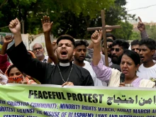 Pakistan minority rights campaigners protest the sentencing of a Christian man to death for sharing an allegedly blasphemous TikTok post in Karachi on July 2, 2024.