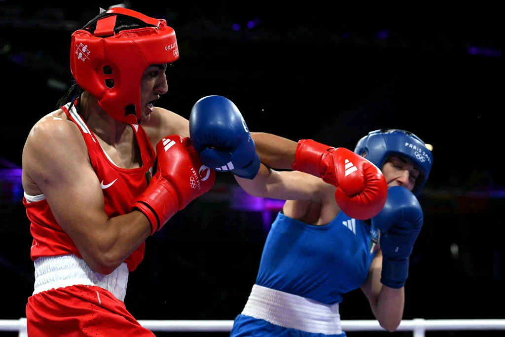 Algeria’s Imane Khelif (in red) punches Italy’s Angela Carini in the women’s 66kg preliminaries round of 16 boxing match during the Paris 2024 Olympic Games at the North Paris Arena in Villepinte on Aug. 1, 2024.?w=200&h=150