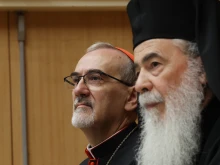 Latin Patriarch of Jerusalem Pierbattista Pizzaballa (left) and Greek Orthodox Patriarch of Jerusalem Theophilos III hold a joint press conference in Jerusalem on July 22, 2025.