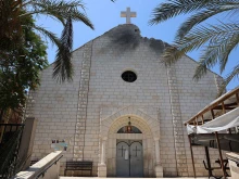 A picture shows a view of a damaged facade of the Holy Family Church on July 18, 2025, a day after it was hit in an Israeli strike in Gaza City on July 17.