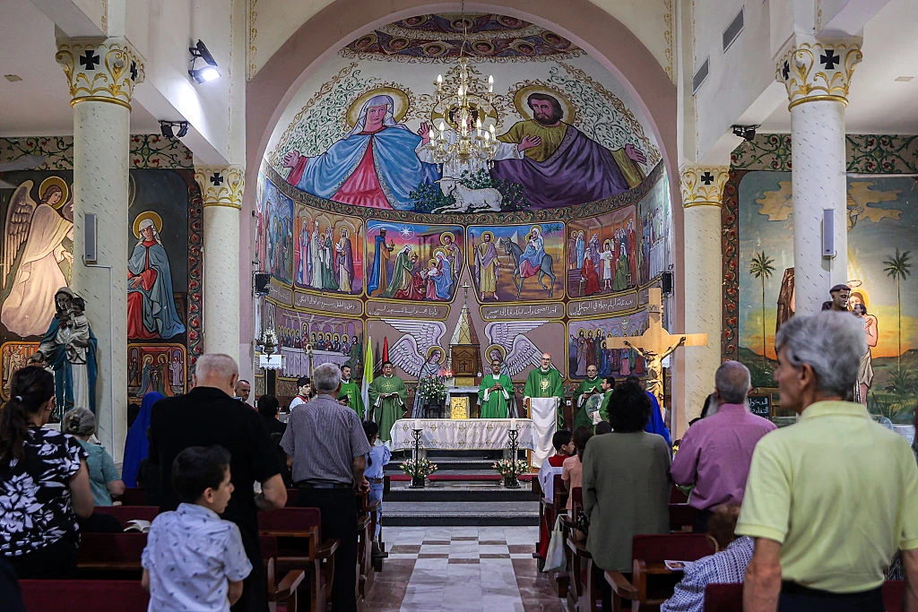 Worshippers attend a Sunday morning Mass led by Cardinal Pierbattista Pizzaballa, Latin patriarch of Jerusalem, at the Roman Catholic Church of the Holy Family in Gaza City on July 20, 2025.?w=200&h=150