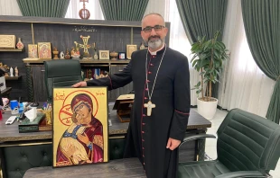 Bishop Benedictus Hanno receives  the Our Lady of Persecuted Christians icon in Qaraqosh, Iraq, on Aug. 6, 2025, from Father Benedict Kiely of Nasarean.org. Credit:  Father Benedict Kiely