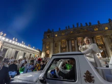 Pope Leo XIV waves from the popemobile during a surprise ride around St. Peter’s Square at the Vatican following the Jubilee of Youth welcome Mass on July 29, 2025.