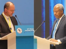 Father Andreas Frick (left) and a CRS official during the SECAM plenary assembly in Rwanda held July 30 to Aug. 4, 2025.