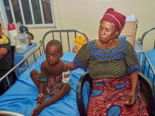 A child who lost his left hand in the June 2025 Yelewata massacre is treated at Nigeria’s Benue State University Teaching Hospital.