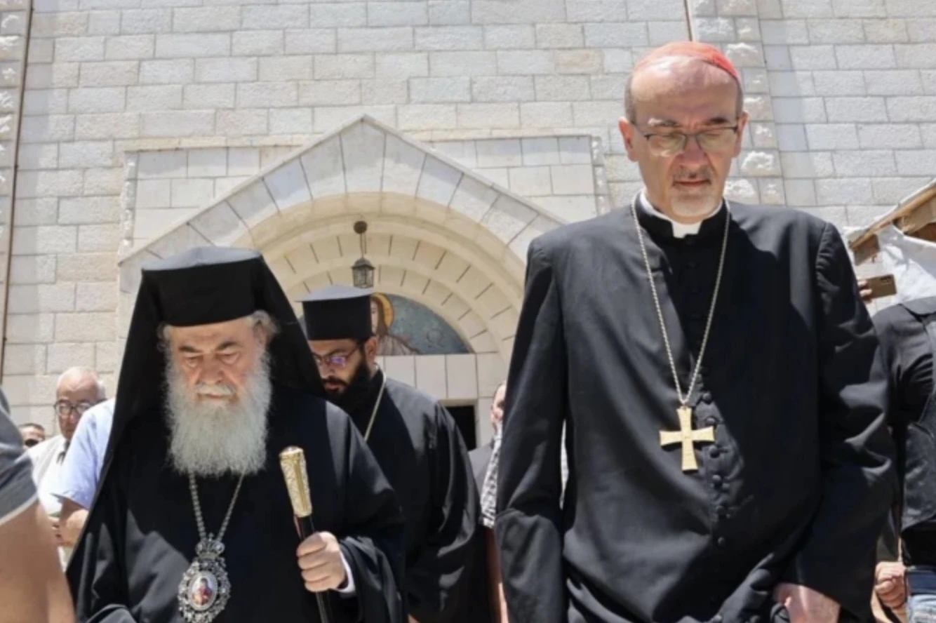 The Latin Patriarch of Jerusalem, Cardinal Pierbattista Pizzaballa, and Greek Orthodox Patriarch Theophilos III, leave the church after a visit to Holy Family Parish in Gaza on July 18, 2025.?w=200&h=150