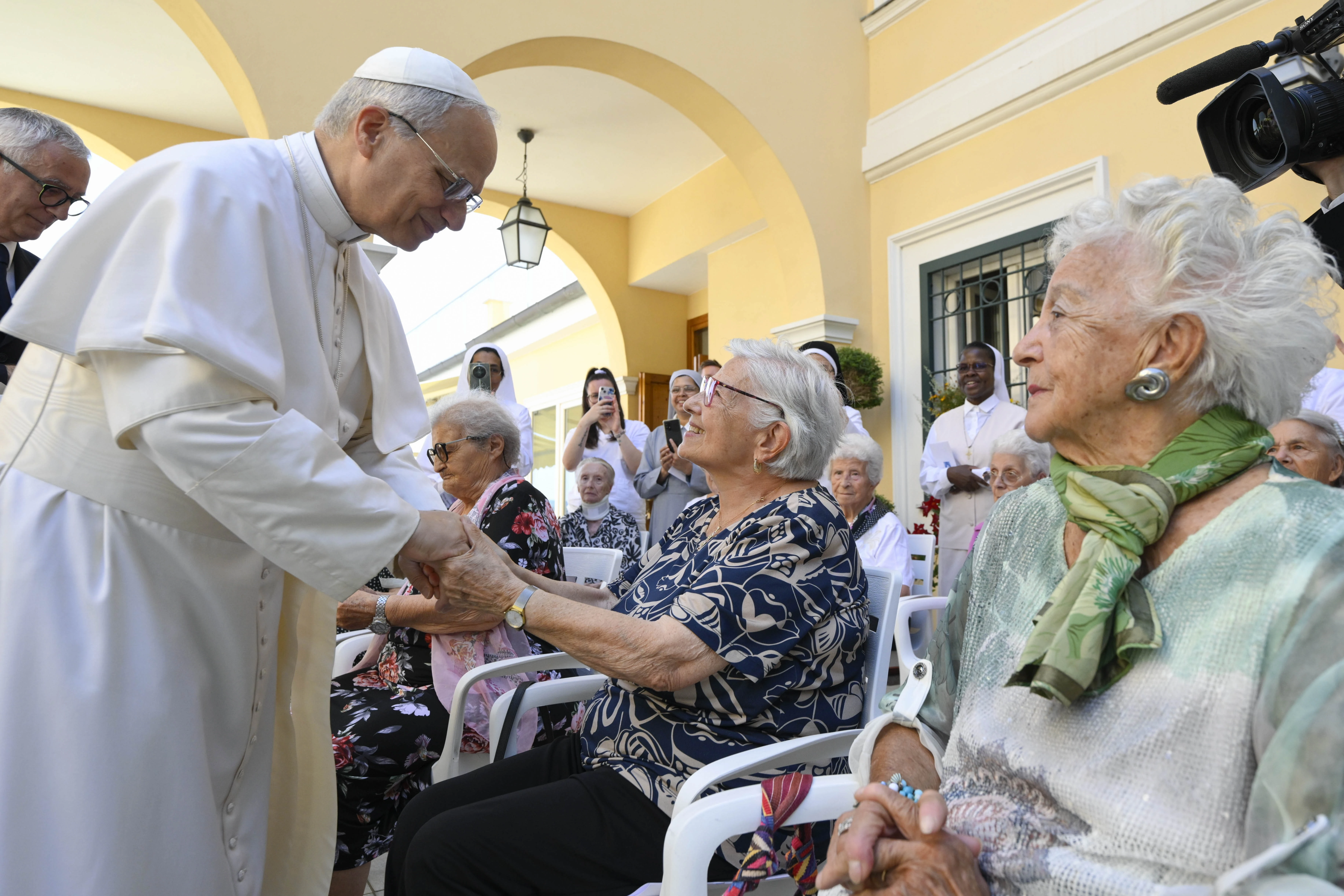 Pope Leo XIV greets residents of St. Martha Home for the Elderly in Castel Gandolfo, Italy, during a visit on July 21, 2025.?w=200&h=150