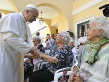 Pope Leo XIV greets residents of St. Martha Home for the Elderly in Castel Gandolfo, Italy, during a visit on July 21, 2025.