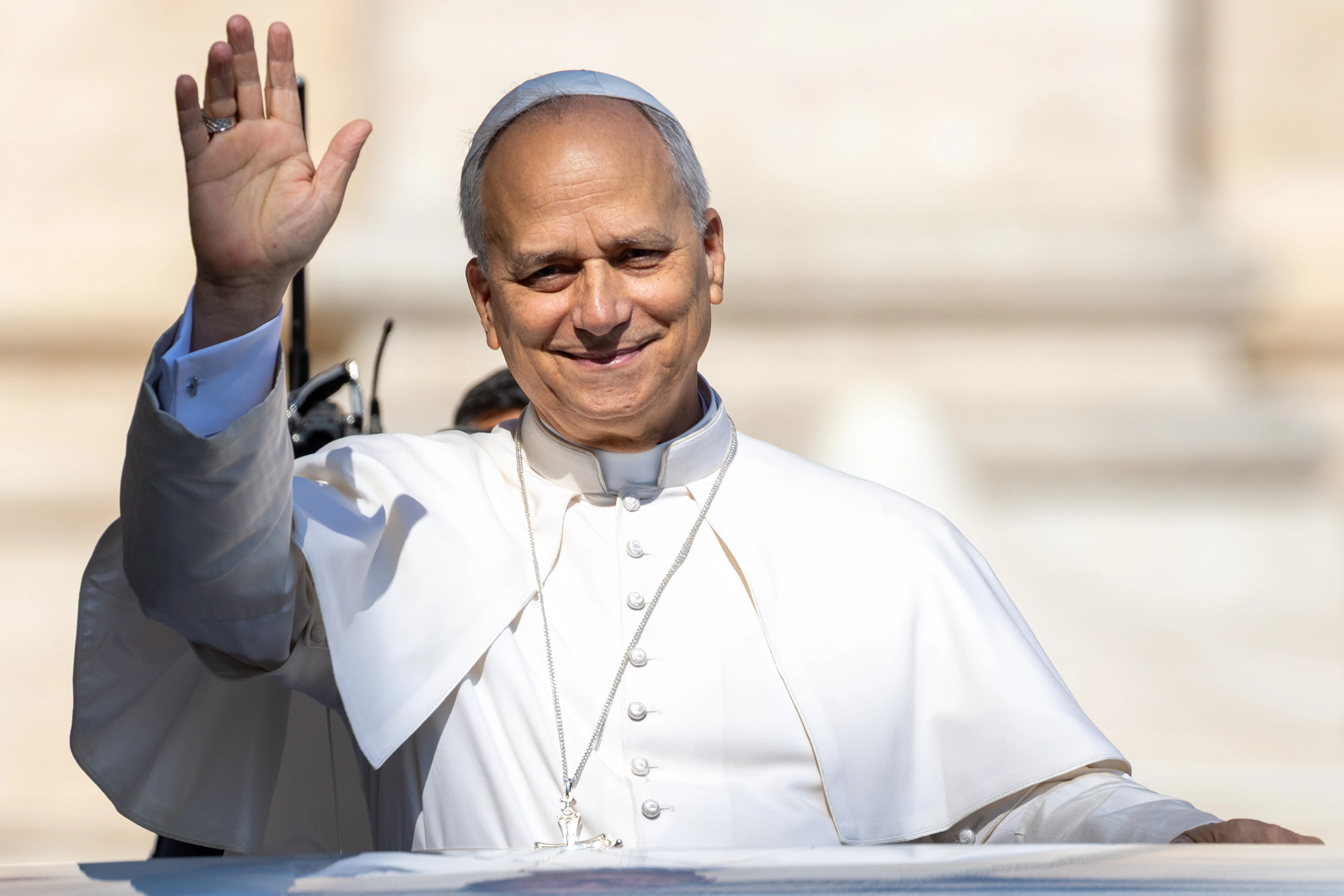 Pope Leo XIV waves to pilgrams gathered in St. Peter’s Square at the Vatican for his Wednesday general audience on Aug. 6, 2025.?w=200&h=150