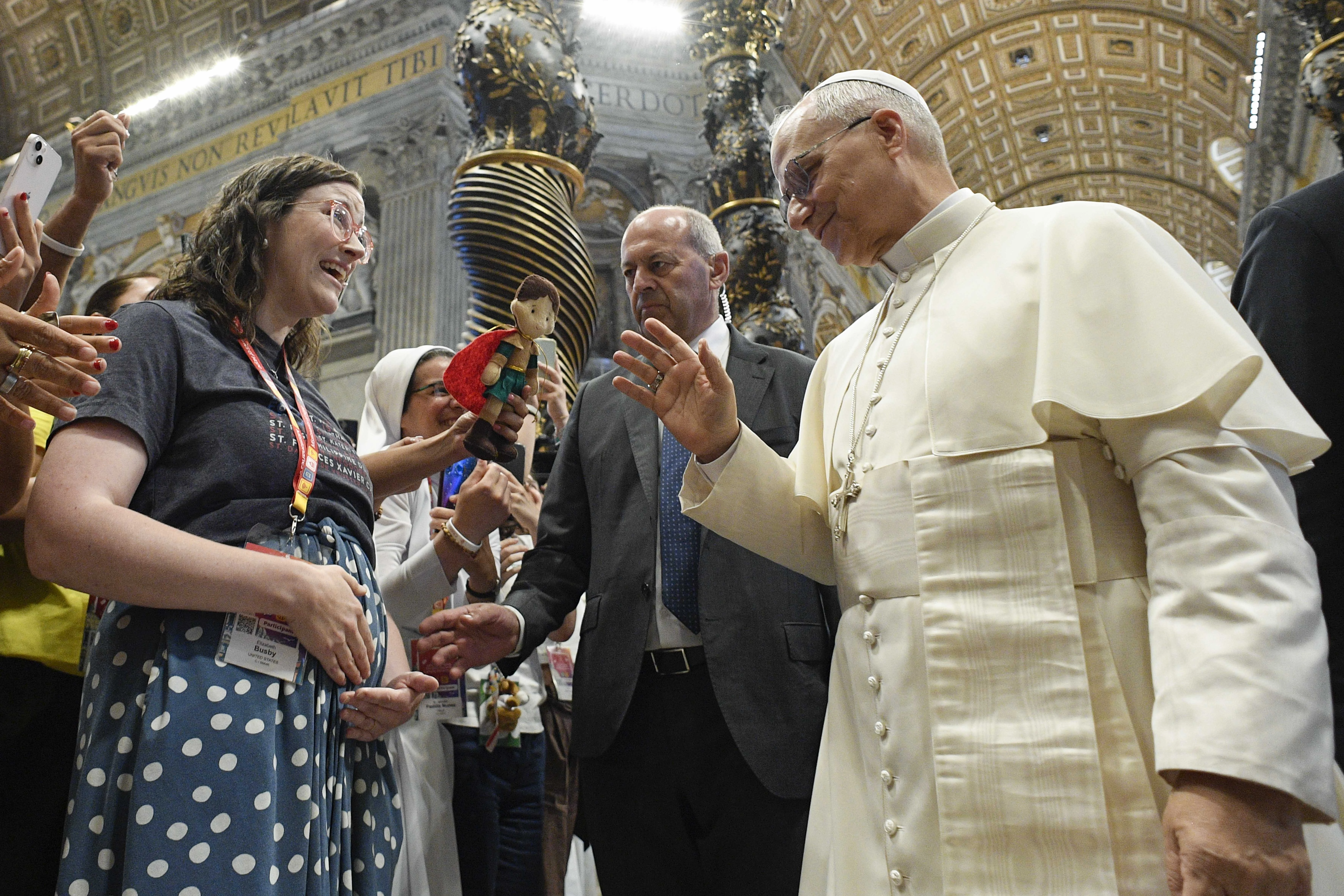 Pope Leo XIV blesses Elizabeth Busby and her baby on the way at the Mass for Digital Missionaries on July 29, 2025, at St. Peter’s Basilica at the Vatican. A family and marriage therapist, Busby hosts the “Discerning Marriage” podcast and developed the Next Step formation program for people who are discerning marriage.?w=200&h=150