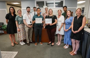 Members of The Catholic University of America Office of Campus Ministry receive their RISE Award from the Associates of St. John Bosco. Credit: Photo courtesy of The Cartiedas