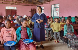 Sister Medhin with school children in Tigray, Ethiopia, in March 2024. The Scotland-based organization Mary’s Meals, which feeds almost 2.5 million children in some of the world’s poorest countries, has been partnering with the Daughters of Charity in Tigray since 2017 to provide meals for thousands of children. Credit: Armstrong Studios // 2024