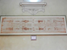 A copy of the Holy Shroud is displayed in the sacristy of the Church of St. Lawrence in Turin, Italy.