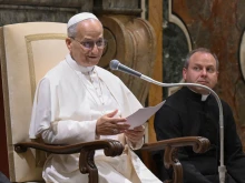 Pope Leo XIV on July 25, 2025, addresses priests belonging to the Society of St. Xavier and participants of a monthlong seminary formators course at the Pontifical Athenaeum Regina Apostolorum at the Vatican.