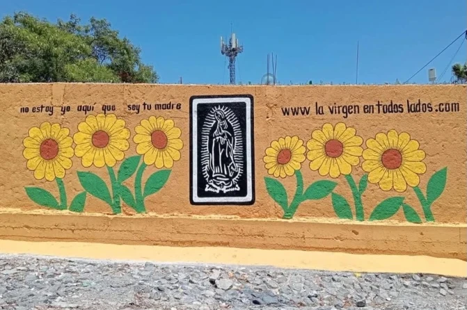 A wall with the image of “The Virgin Everywhere.”?w=200&h=150