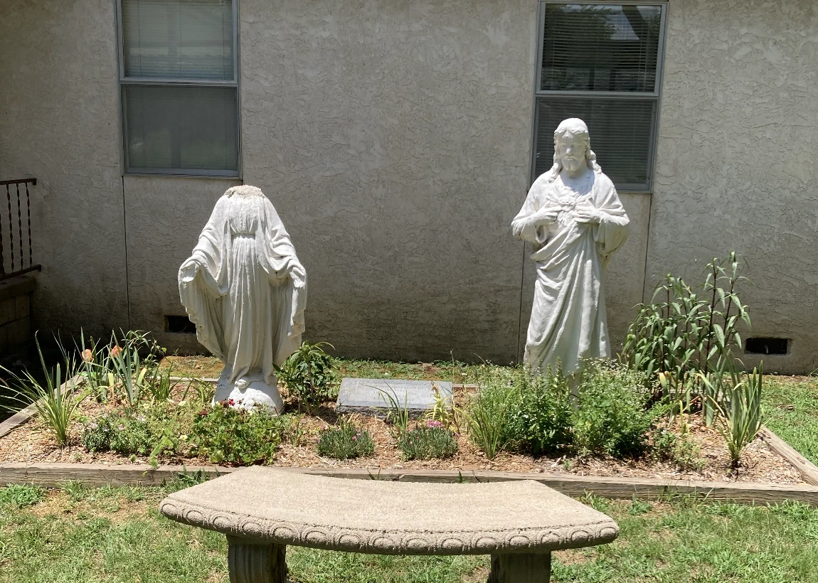 A vandalized statue of Mary, the Mother of God, at St. Leo Parish in Hartford, Arkansas, in July 2024.?w=200&h=150