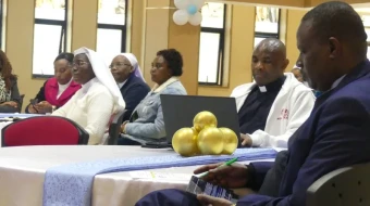 Participants gather at the Aug. 18, 2025, launch event for a new digital app that will bring together 66 Catholic radio stations in east Africa. Father Don Bosco, editor-in-chief of ACI Africa, CNA’s news partner in Africa, is pictured in the center.