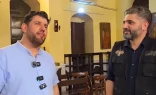 Syrian Minister of Culture Mohammed Saleh with Islamic chanter Al-Mu’tasim Billah Al-Assali inside St. Ananias Orthodix Church in Damascus, Syria. Billah Al-Assali performed an Islamic hymn with lyrics that directly contradict Christian beliefs.
