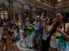 Young people raise their voices from the Basilica of Santa Maria in Trastevere on Aug. 1, 2025.